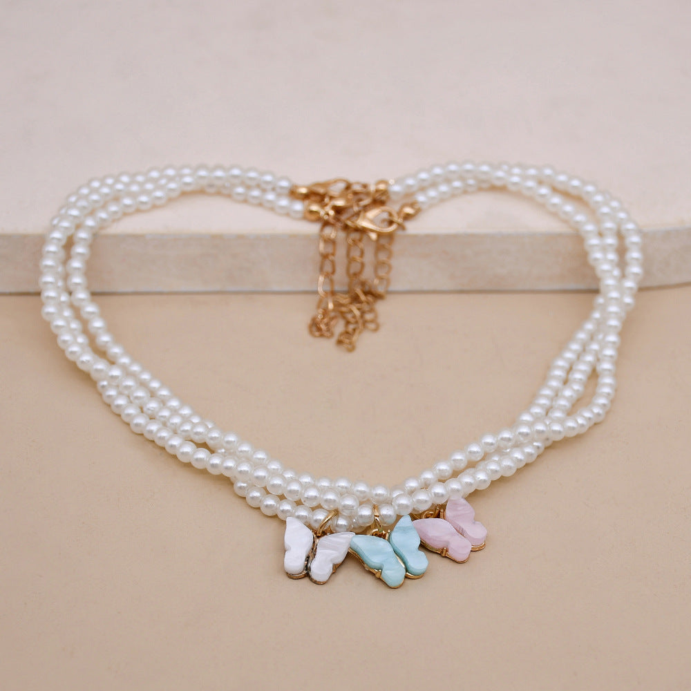 Rozene Pearl Butterfly Choker - Elegant Statement Necklace